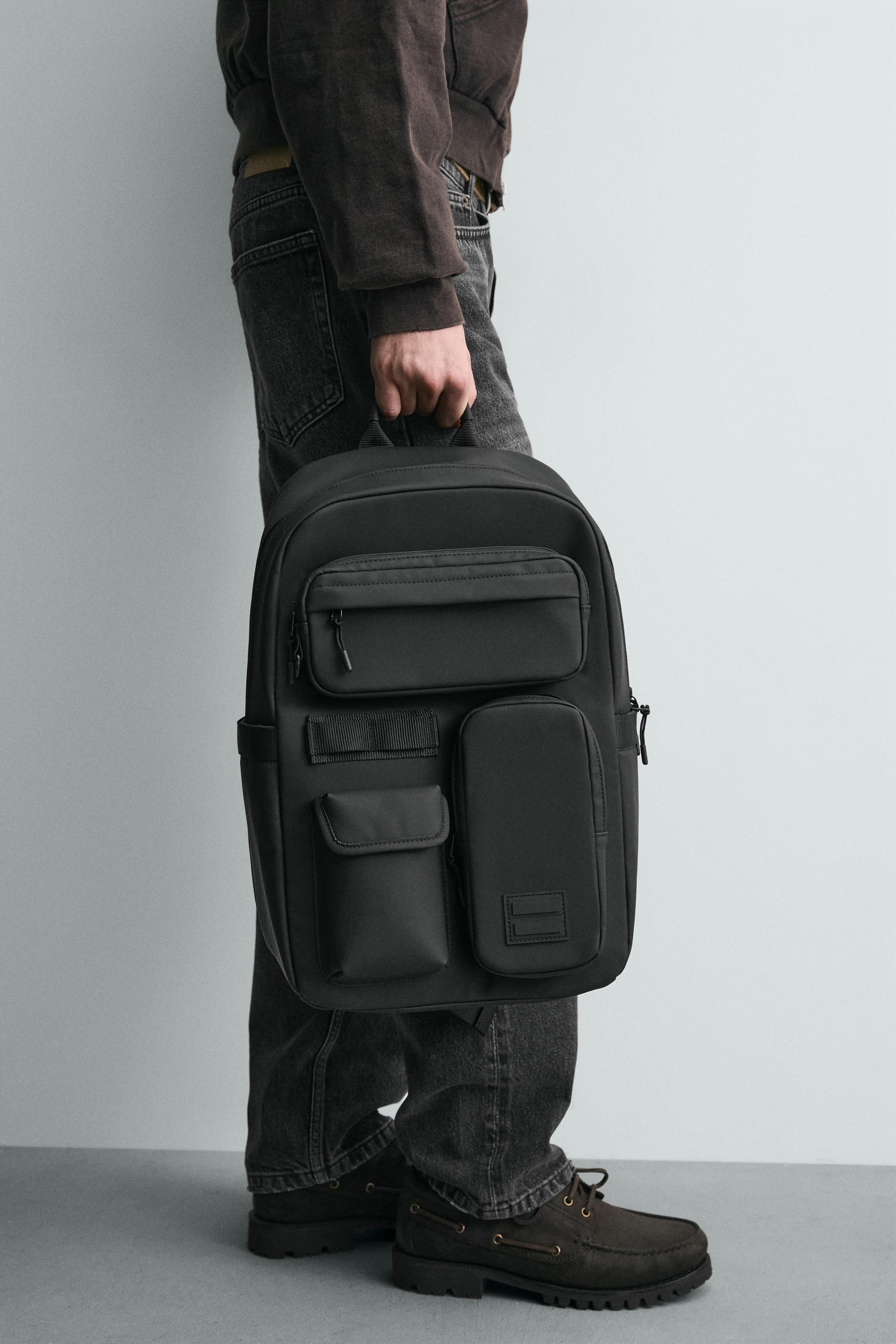 RUBBERIZED MULTI-POCKET BACKPACK